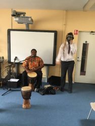 Reiss volunteers to do an African dance.