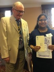 Trevor Rankin, President of Newtownabbey Rotary Club presented Nekha with her award and a cash prize.